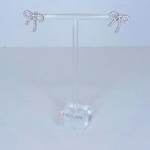 NEW…Clear/Silver bow tie earring OS (one size) from Forever21